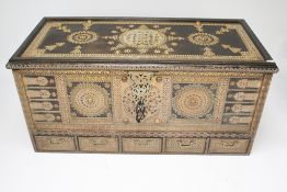 A substantial Anglo Indian brass bound studded chest.