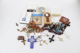 A box of assorted Christian related jewellery.