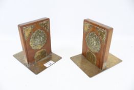 A pair of Chinese brass mounted wooden bookends.