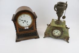 Two assorted vintage mantel clocks.