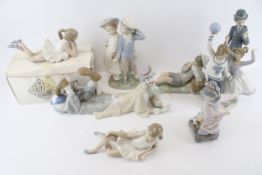 A collection of assorted Spanish porcelain figurines.