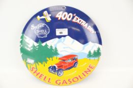 A reproduction retro enamel 'Shell Gasoline' wall sign. Diameter 29.