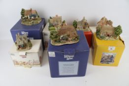 A collection of seven assorted Lilliput Lane cottages. All boxed, including 'The Greengrocers', etc.