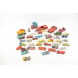 A quantity of assorted playworn vintage diecast model vehicles.