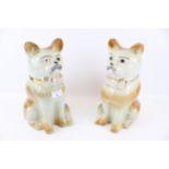 A Pair of Scottish (Bo'ness?) Staffordshire style seated ceramic cats with glass eyes. H31.