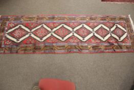 A kilim style wool runner carpet.