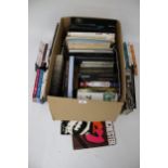 A collection of assorted books. Film, cinema and pop music related plus 'Friends' dvd box sets.