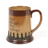 A late 19th century Doulton Lambeth saltglaze stoneware American market motto tankard. Impressed J.