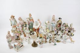 A collection of continental porcelain figures.