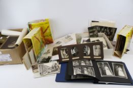 A large collection of early 20th photographs and negatives. Some military interest, etc.