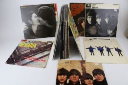 Assorted vintage vinyl LP records including the Beatles, etc.