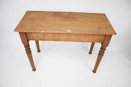 A vintage bleached oak side table.