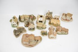 A collection of seventeen assorted model English cottages.