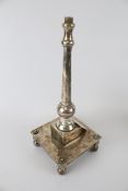 A silver plated lamp base.
