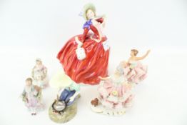 A collection of assorted vintage porcelain figures.