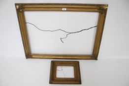 Two gilt wood picture frames. Max.