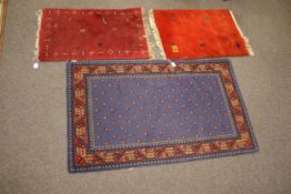 Three contemporary wool rugs.