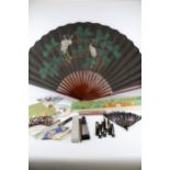 A collection of contemporary fans. Including Oriental and European styles, fabric and paper. Max.