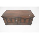 An early 20th century oak stained walnut low Cabinet.