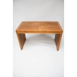 A contemporary Art Deco style light oak desk.