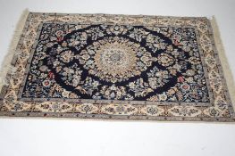 A 20th century Eastern carpet.