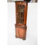 A 20th century mahogany Georgian style corner display cabinet.