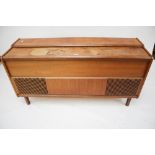 A mid-century modern teak radiogram cabinet.