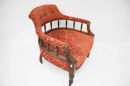 A mahogany framed open arm tub chair.