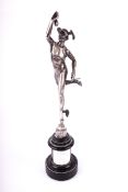A silver figure of 'Flying Mercury' afte