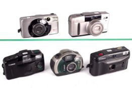 Two Canon 35mm point and shoot cameras and three obsolete APs formats.