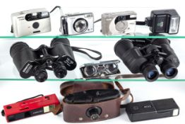 A collection of cameras and binoculars.