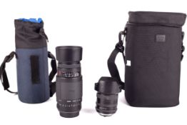 Two camera lenses and two soft pouches.