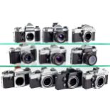 Ten assorted Praktica 35mm SLR cameras.