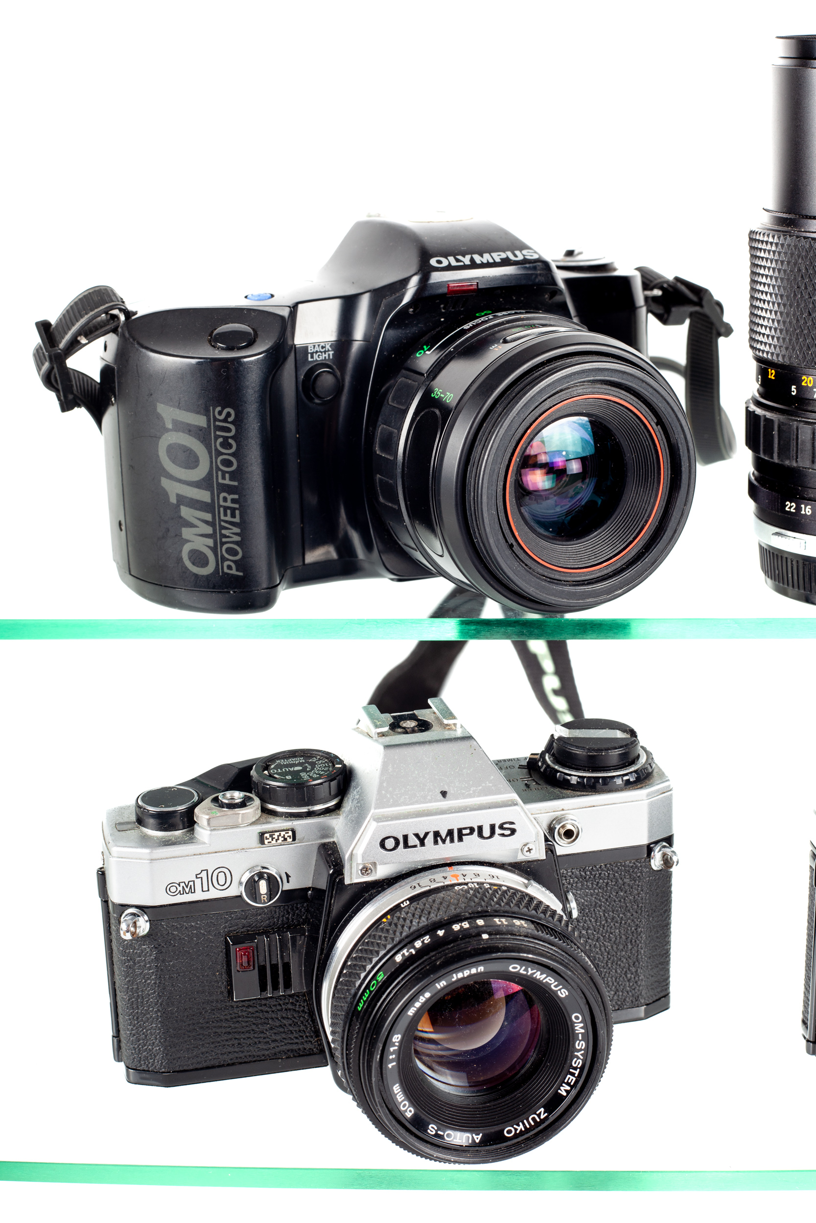 A group of Olympus cameras and lenses. To include two Olympus OM10 cameras each with 50mm f1. - Image 2 of 4