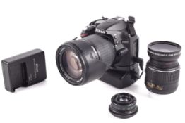 A Nikon D3200 camera with battery and carry case,