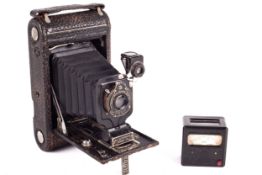 A Kodak Jr No.1 Autographic folding bellows camera.