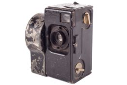 An Andre Debrie SEPT 35mm clockwork cine camera. Black, serial number W09139. With a H.
