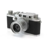 A Leica IIIc 35mm rangefinder camera, 1950, chrome. Serial Number 518220. With a 5cm f2.