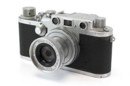 A Leica IIIc 35mm rangefinder camera, 1950, chrome. Serial Number 518220. With a 5cm f2.