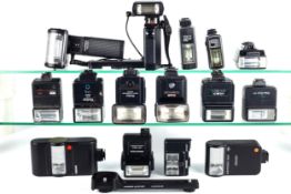 An assortment of camera flash guns.