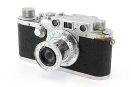 A Leica IIIc 35mm rangefinder camera, 1950, chrome. Serial Number 514874. With a 5cm f3.