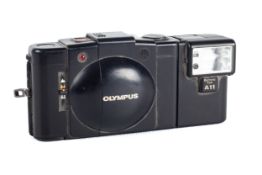 A Olympus X45 camera with an electronic flash