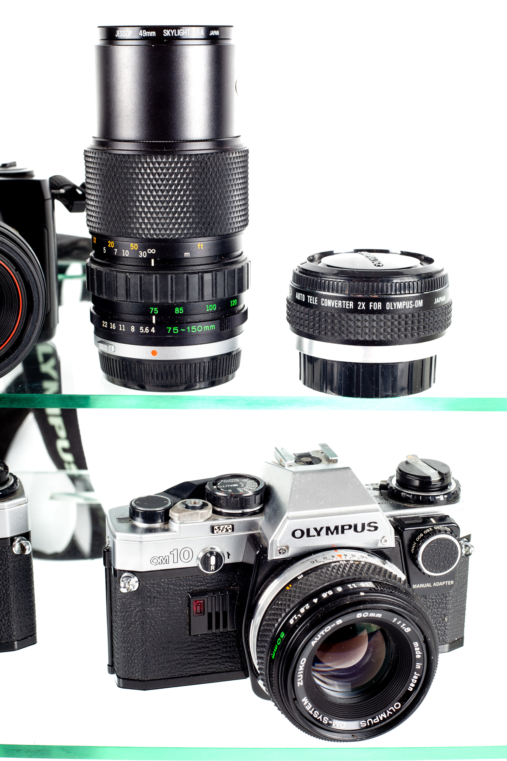 A group of Olympus cameras and lenses. To include two Olympus OM10 cameras each with 50mm f1. - Image 3 of 4