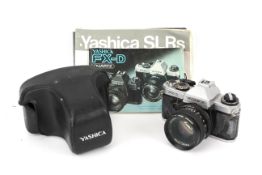 A Yashica FX-D Quartz 35mm SLR camera. With a Carl Zeiss 50mm 1:1.