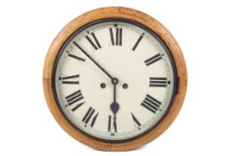 An early 20th century eight-day wall clock.