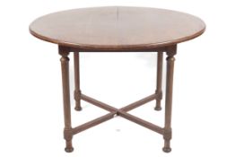 Arts and Crafts : Heal's oak circular table.