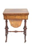 A Victorian burr walnut and walnut games/sewing table.