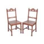A pair of 19th century Gothic Revival spruce/pitch pine chairs.