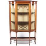 An Edwardian mahogany display case.