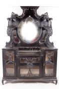 A late 19th century Continental mirror back break front sideboard with glazed cupboards under.